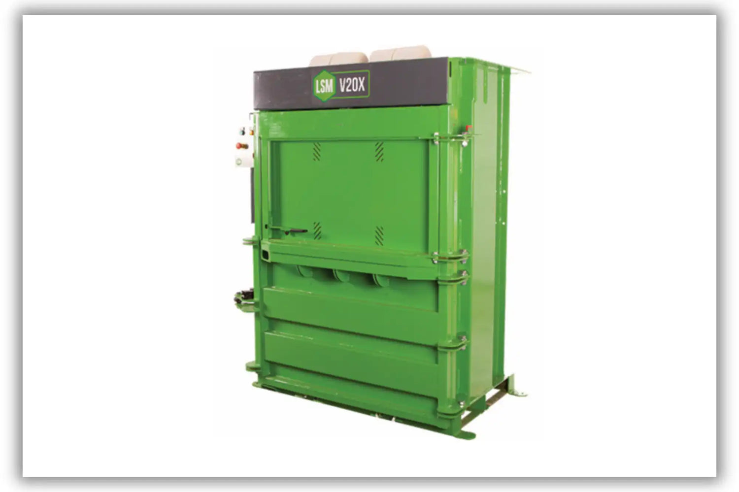 Green vertical baler.