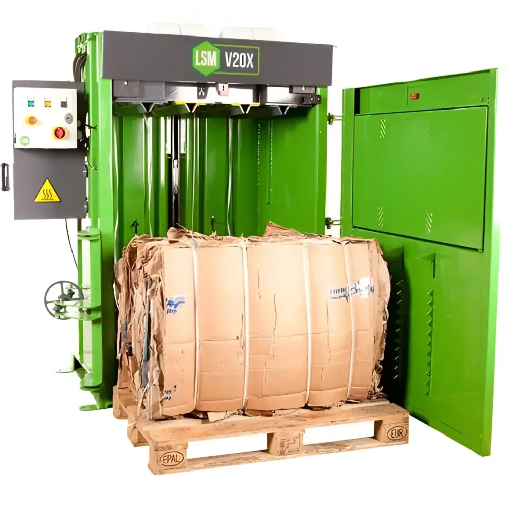 Green V20x Cross Ram cardboard waste baler with produced cardboard bale for low ceiling spaces